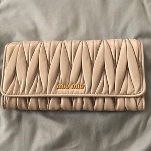 New! Miu Miu matelasse wallet taupe color